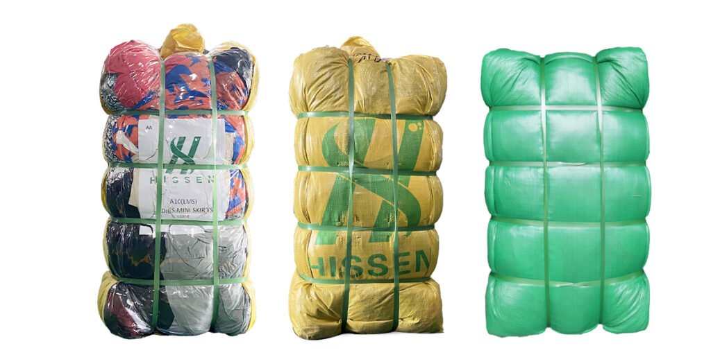 Several samples of well-packed and secured bales of used vintage clothing prepared by Hissen Vintage.